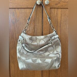 Vintage coach c tan purse with silver hardware. Overall great condition.